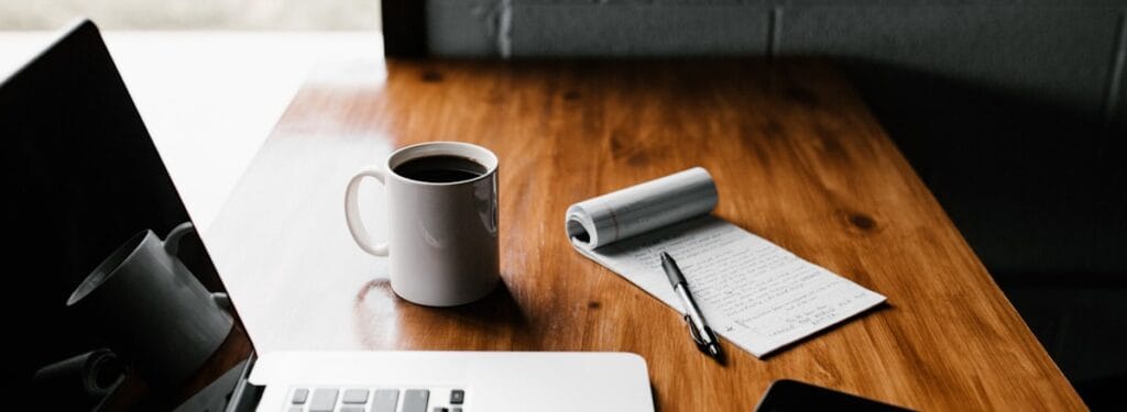 Laptop with content and coffee